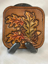Load image into Gallery viewer, Hand Tooled Leather Oak Leaf Coasters with Horseshoe Stand
